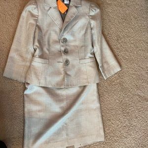 A two piece. Suit top + skirt.